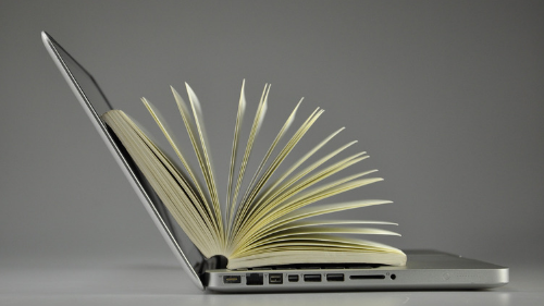 a book on a laptop