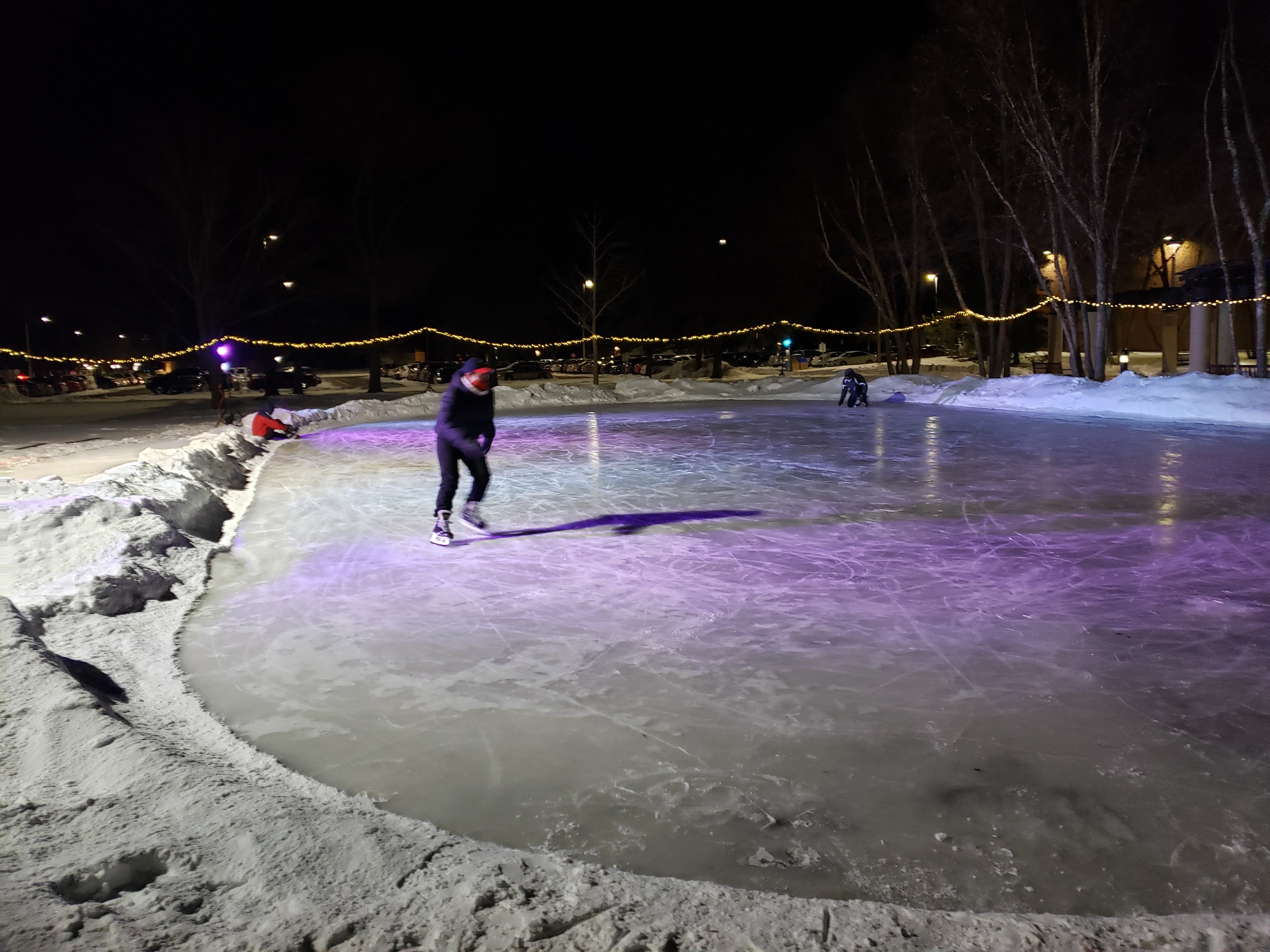 a person skating on an ice rink