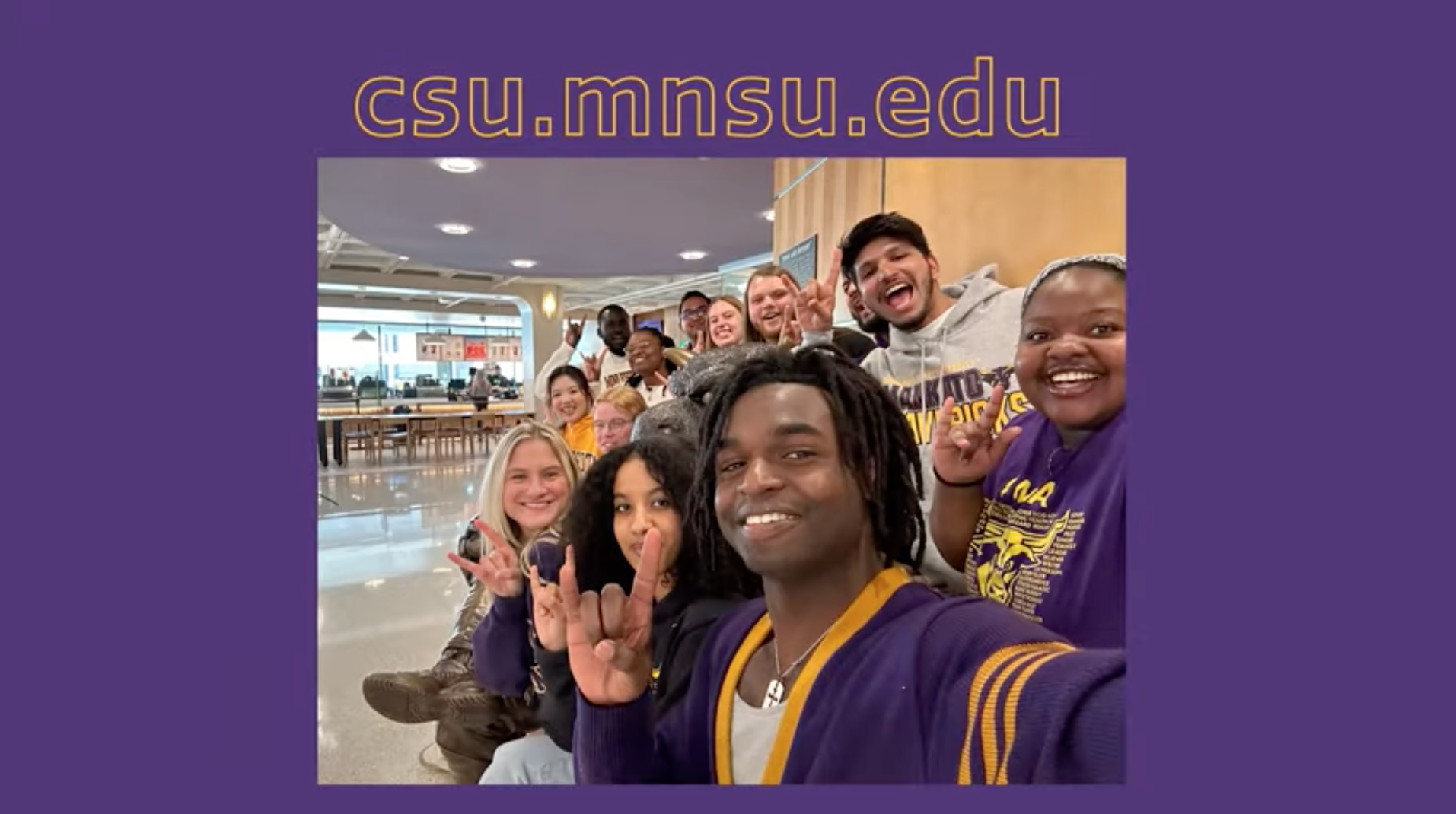 Minnesota State University Mankato students posing in the Centennial Student Union for a group photo