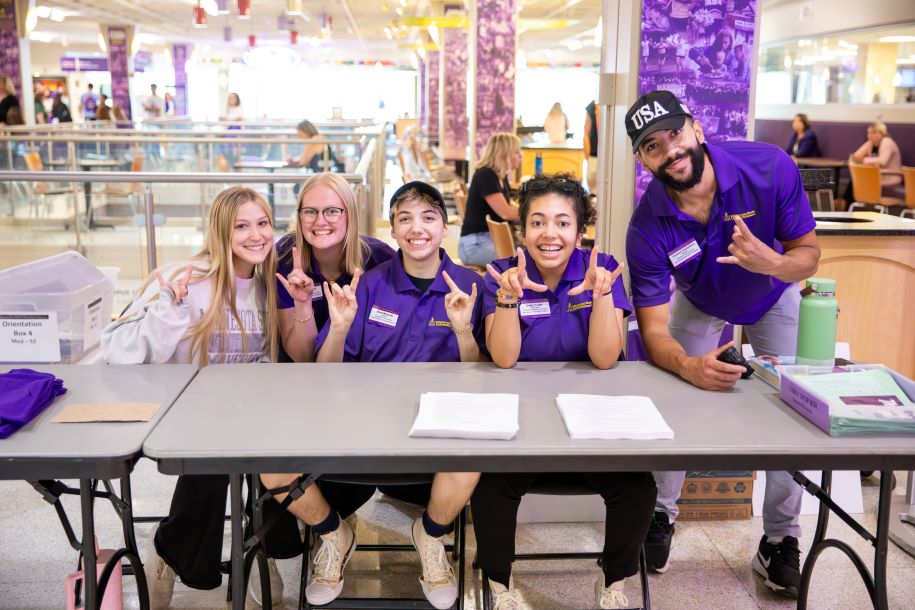 a group of people posing for a photo