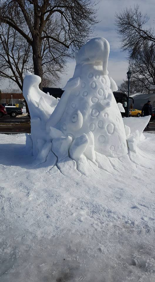 a snow sculpture in a park