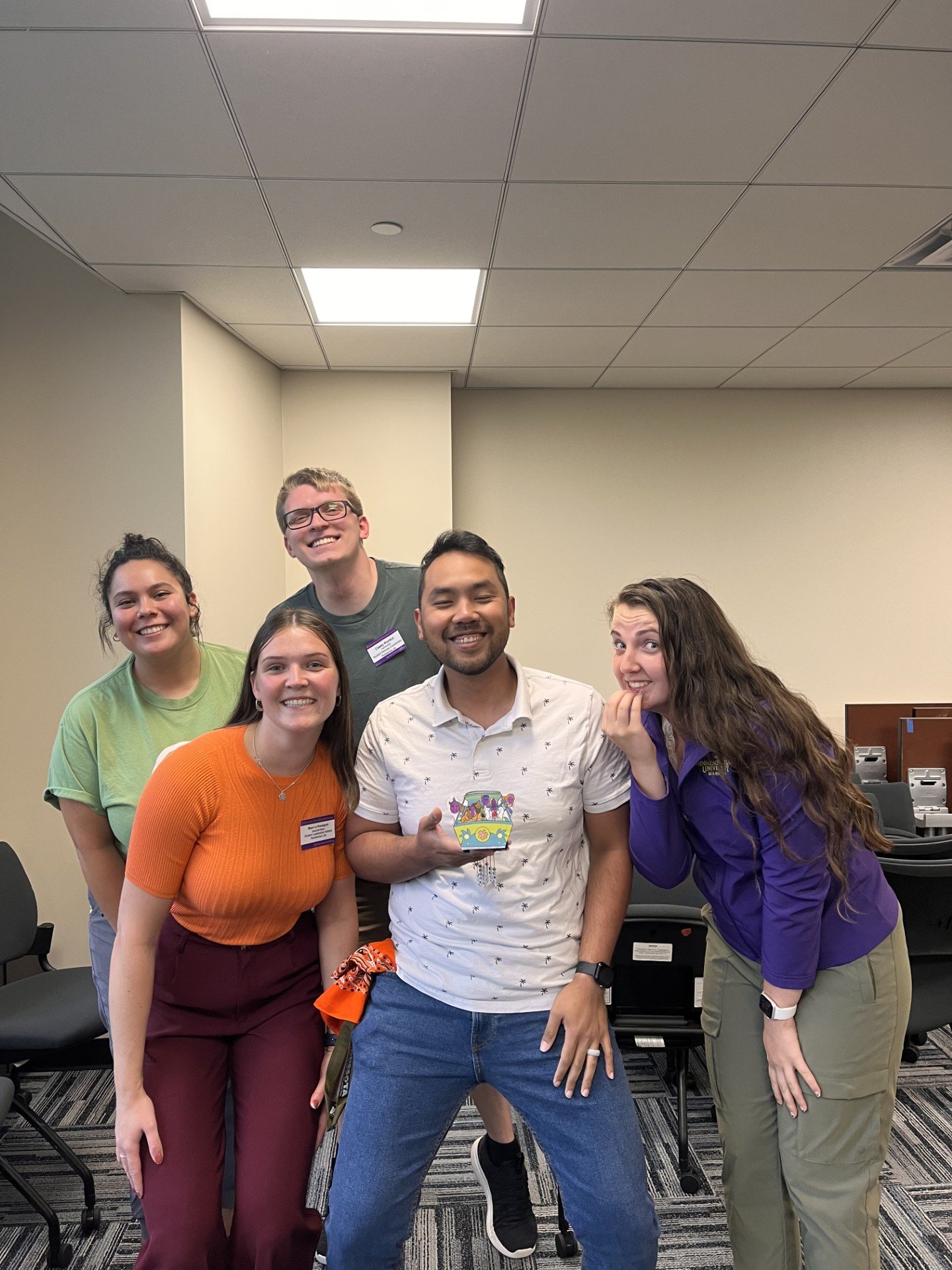 a group of people posing for a photo